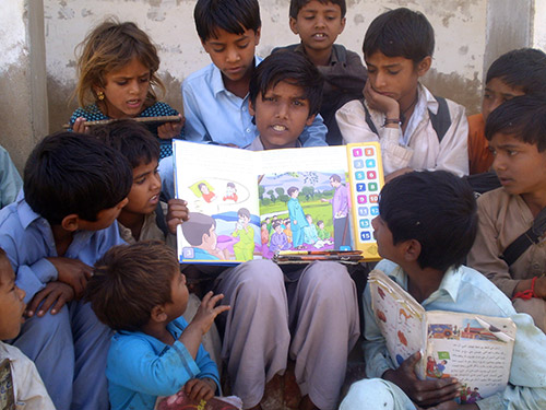 Children with Speaking Books.